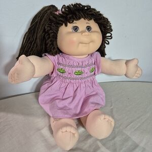 Adorable Doll in Pink Dress with Brown Hair